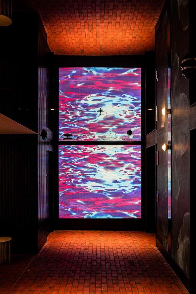 Hotel Qt Newcastle Intérieur photo The 10-metre-high (33 ft) glass wall in the foyer